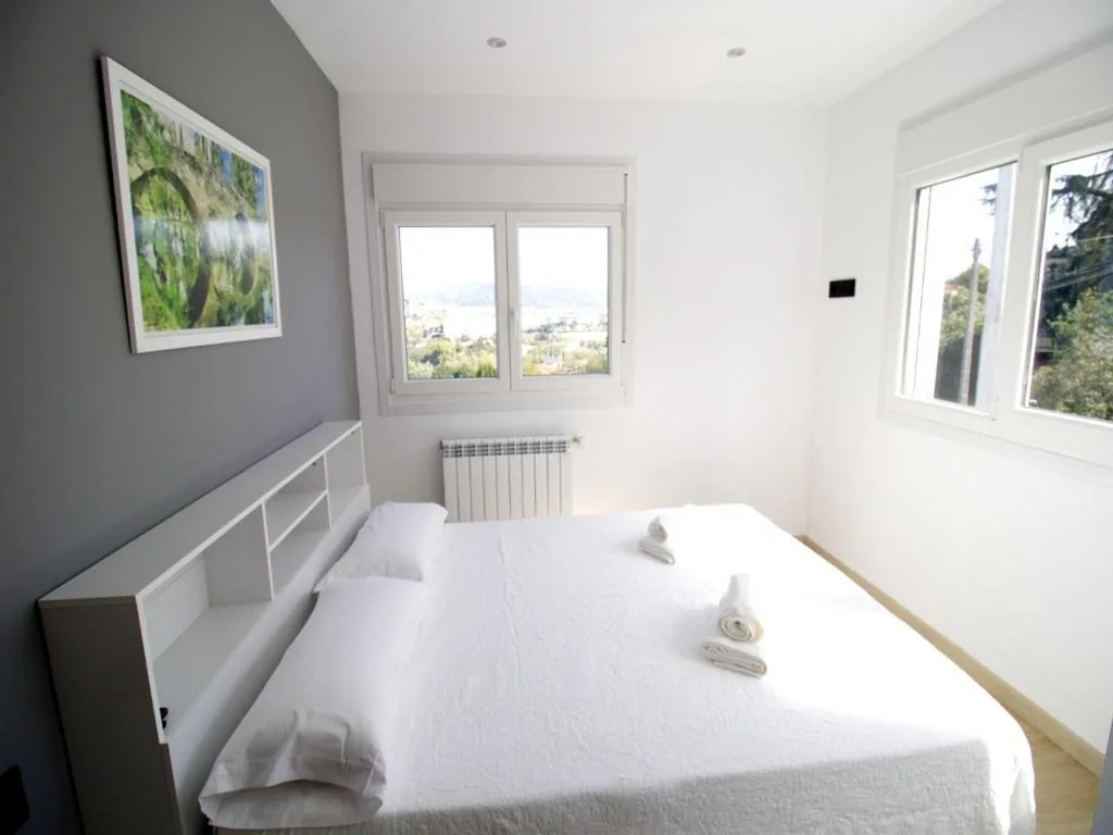 Suite con vistas a la ciudad — CASA MIRADOR REZA Alojamiento Termas