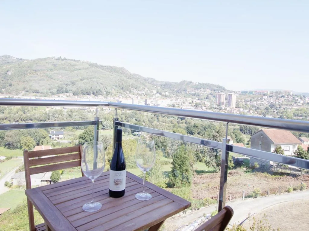 Suite con vistas al río — CASA MIRADOR REZA Alojamiento Termas