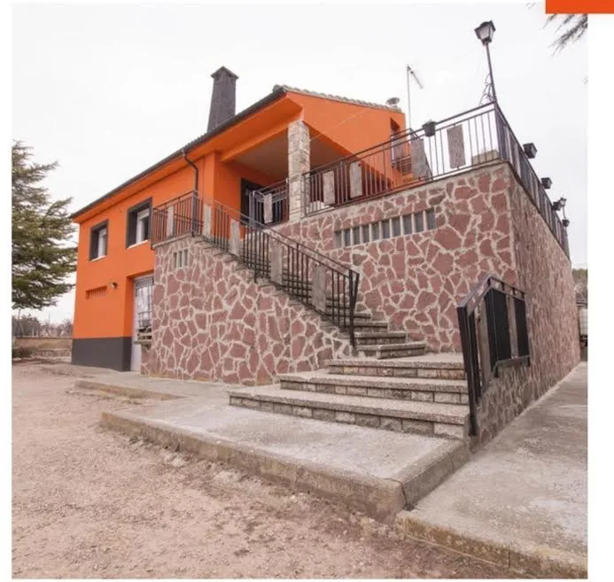 Huis — Casa naranja