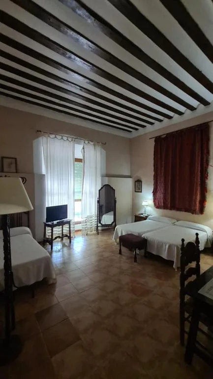 Habitación Triple Estándar — Casa Palacio Conde de Garcinarro