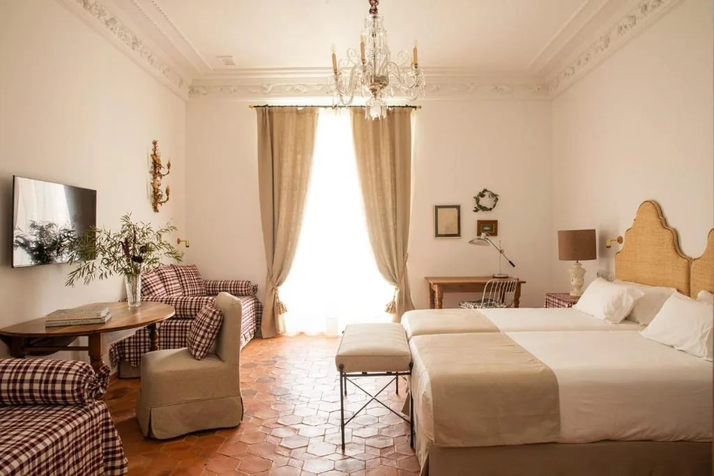 Habitación Familiar Deluxe — Casa Pizarro Hotel
