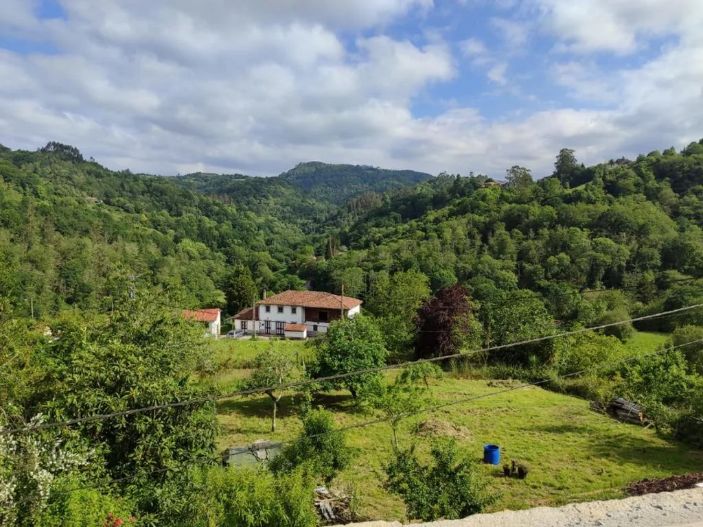 Habitación Doble Deluxe con cama supletoria — Casa Rural El Llar del Busgosu