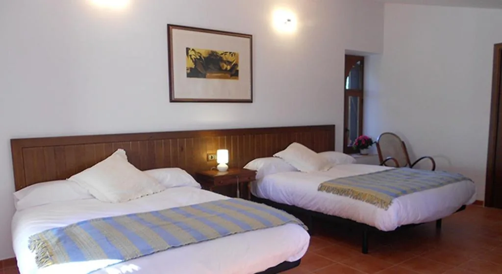 Suite con terraza — Casa Rural El Sequer