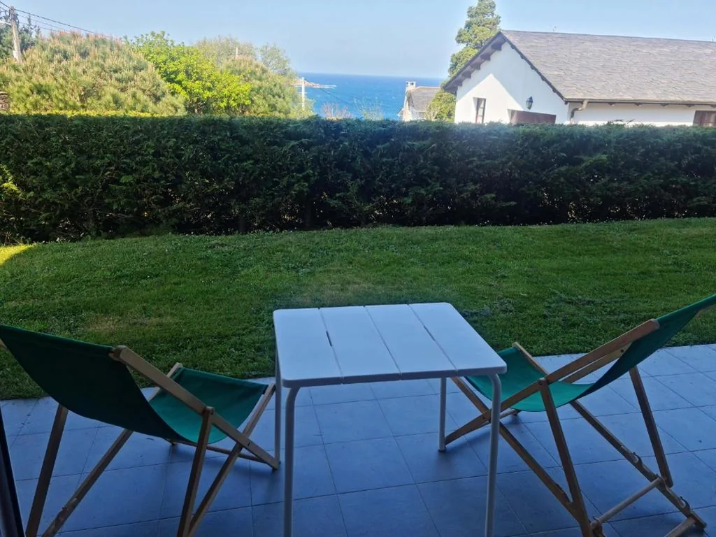 Estudio con vistas al jardín — Casa Tésera