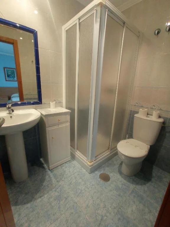 Habitación Triple con baño privado — Casa Tito