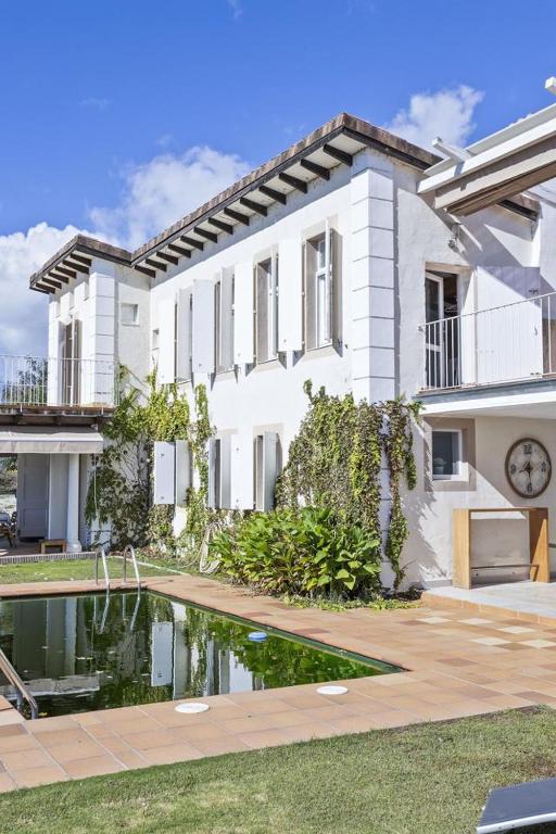 Casa vacacional con piscina, pádel y BBQ