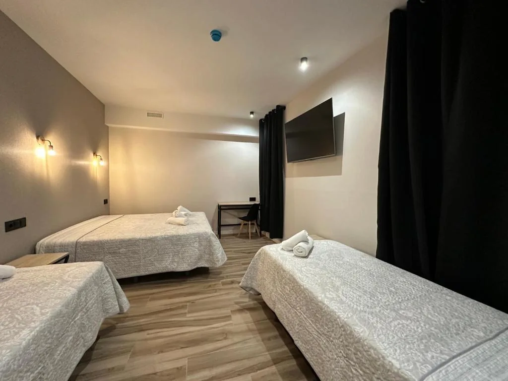 Habitación cuádruple — CC Opera Suites