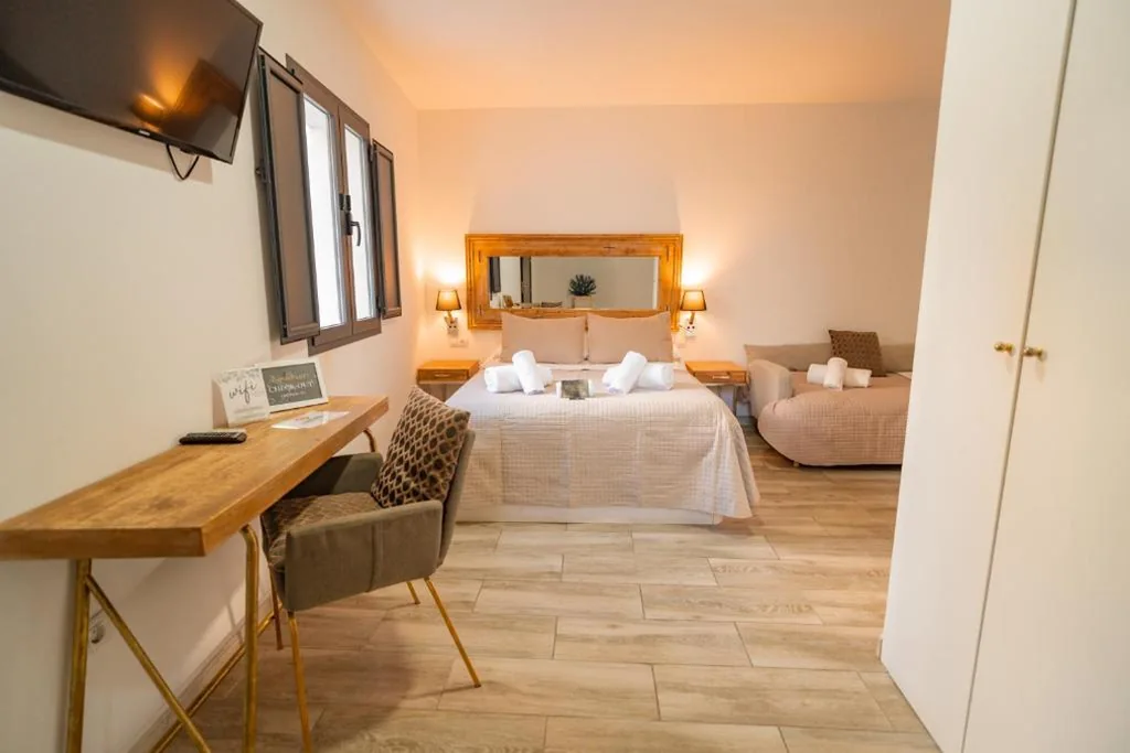 Camera doppia con letto supplementare — Center Suites San Eloy