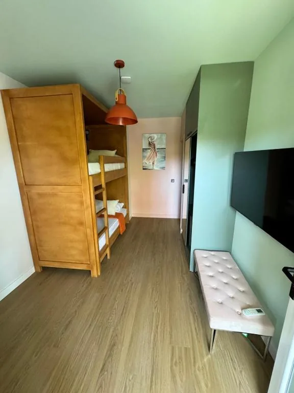 Camera Tripla Deluxe — Charm Beach Retreat