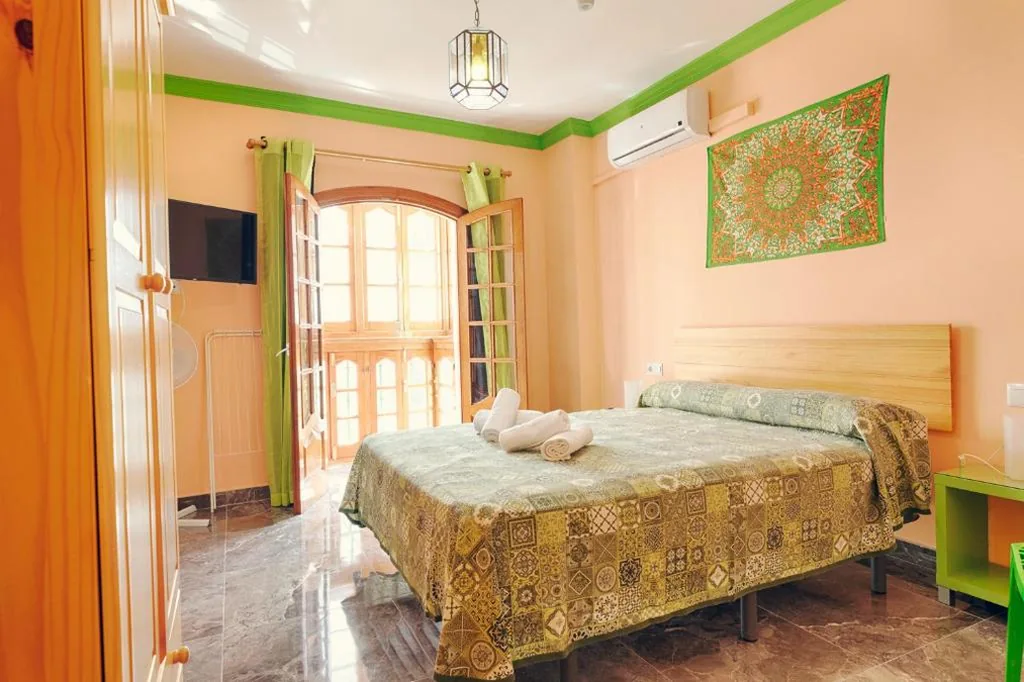 Double Room with Balcony — Charming Nerja Hostel