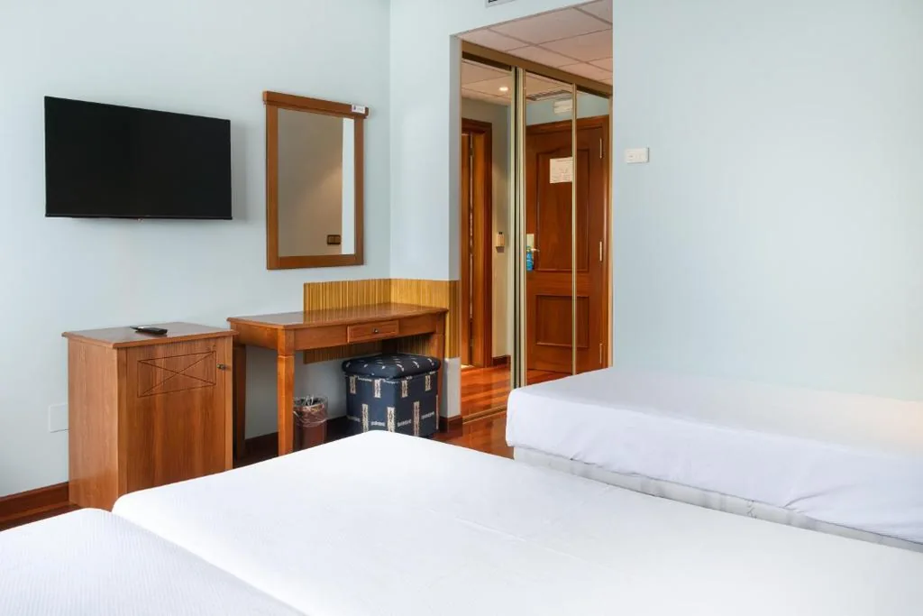 Quarto Triplo Standard — Checkin Basic León Norte