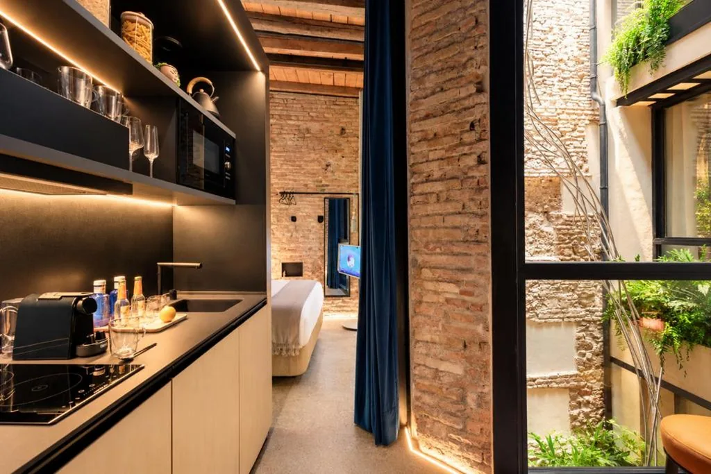 Superior Art Studio with Patio View — Coeo Despertar Rooftop Terrace Exclusive Apartments