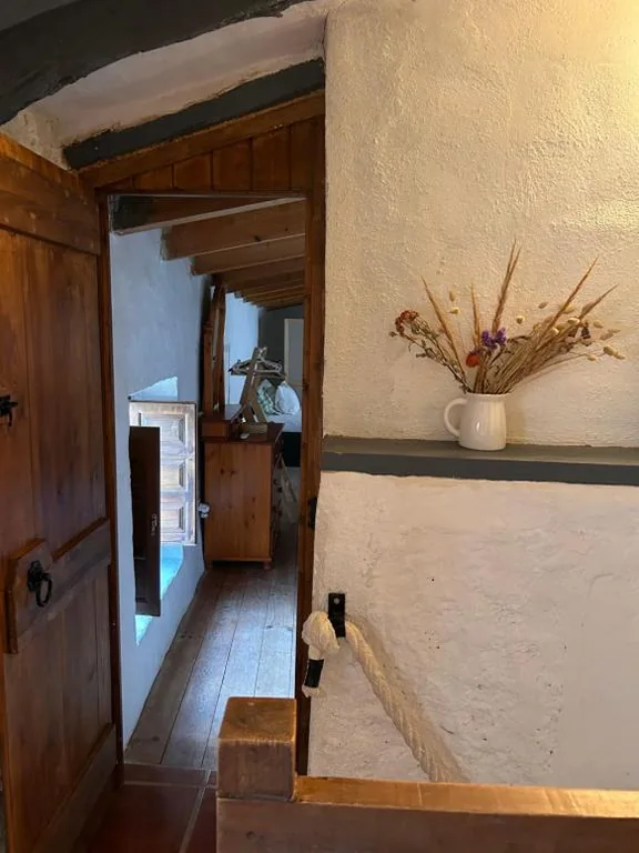 Camera quadrupla con vista sulle montagne — Cortijo Vacas Gordas B&B