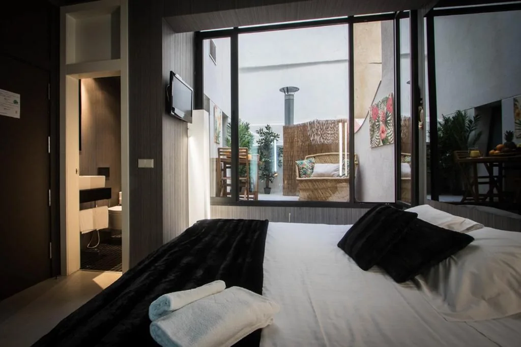 Habitación Triple — Cosy Rooms Embajador