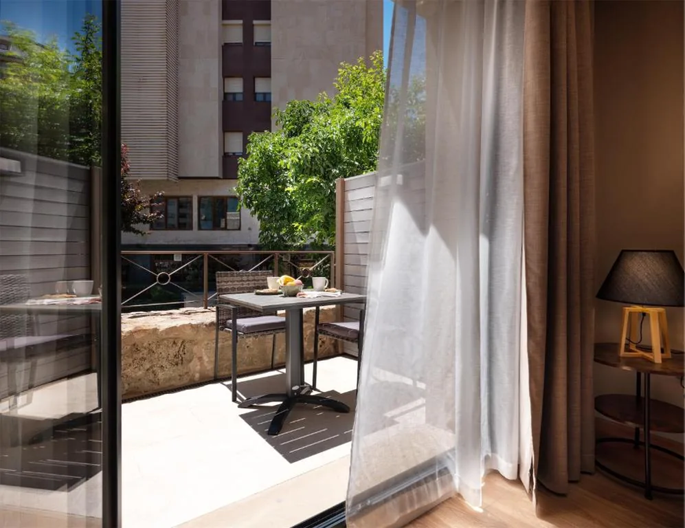 Suite com terraço — Dauria Suites HA