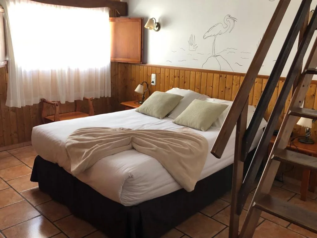Habitación Cuádruple Dúplex — Delta Hotel