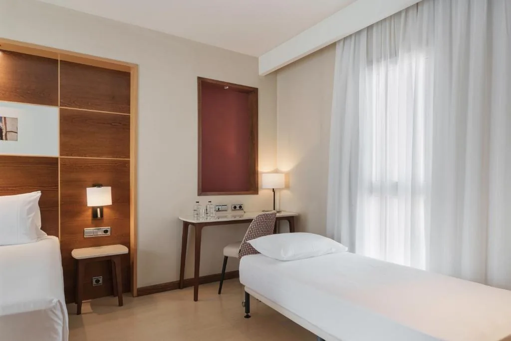 Chambre double avec lit d’appoint (3 adultes) — Dorma León
