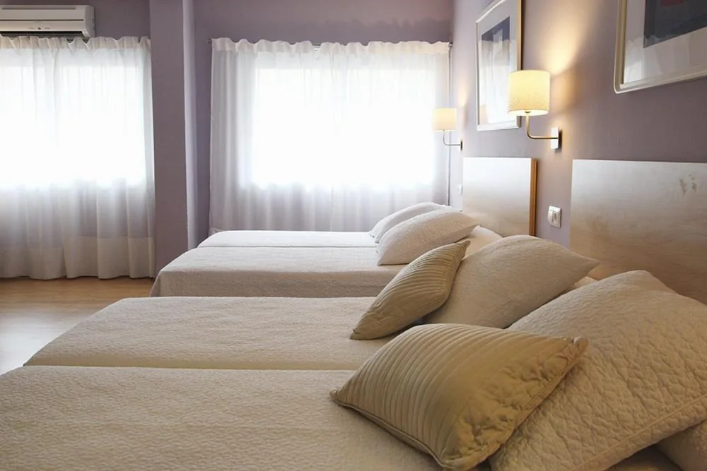 Chambre quadruple — Dormavalencia Hostel