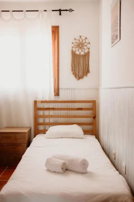 Single Bed in Female Shared Dormitory Room — Dreamwaves Surf House Lajares Fuerteventura