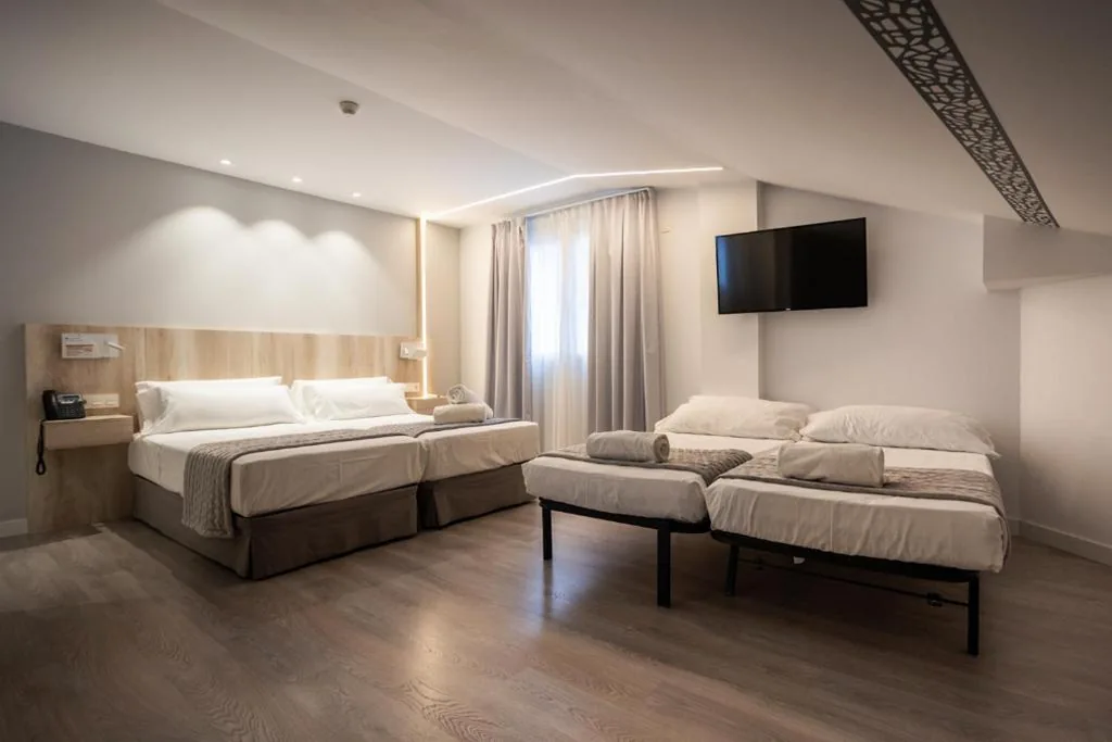 Habitación Cuádruple Clásica — DWO Ábaster