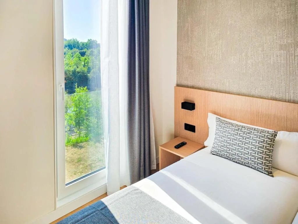 Standard Triple Room — DWO San Sebastián