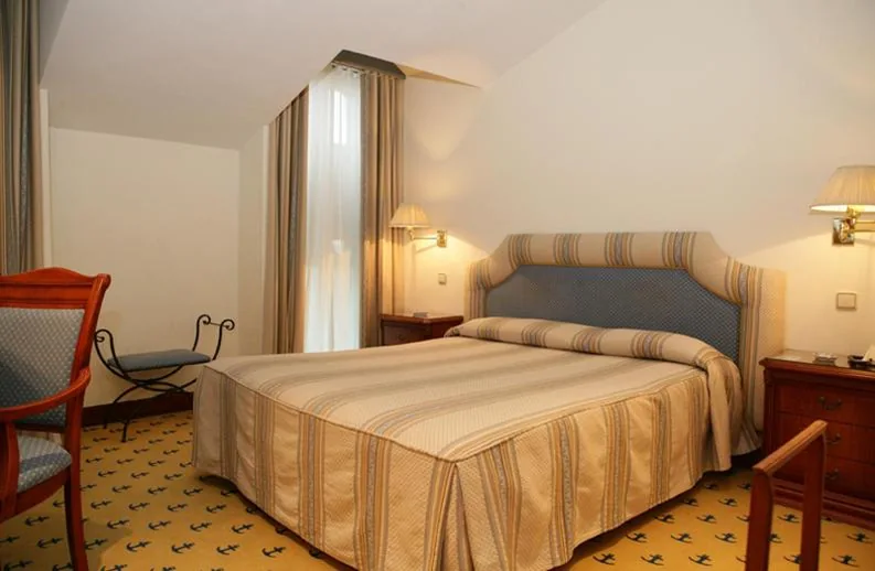 Quarto Duplo com Vista Jardim - 1 ou 2 camas — El Ancla