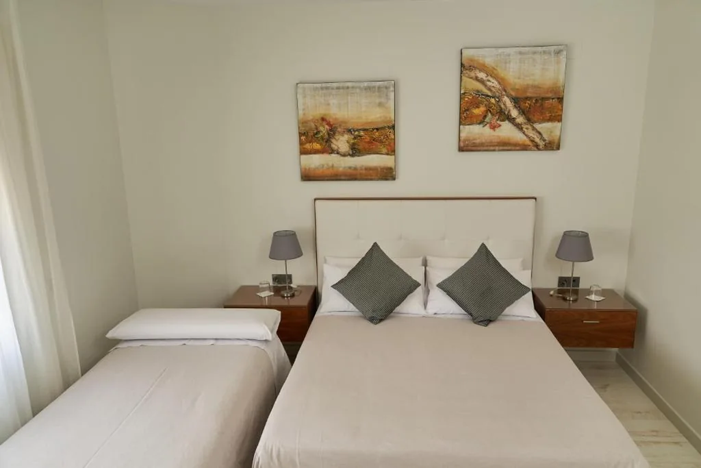 Dreibettzimmer — El Hostal de Violeta