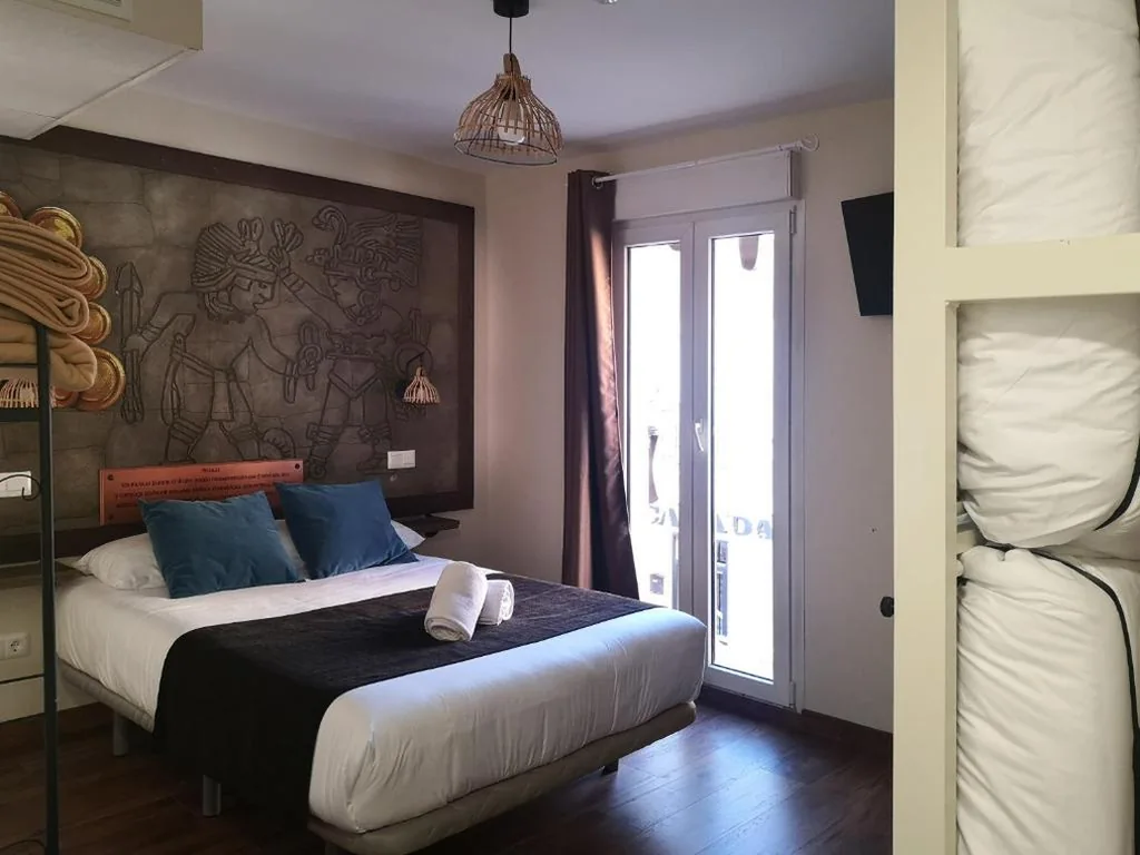 Vierbettzimmer mit Balkon — El Indio Chocolatería Boutique
