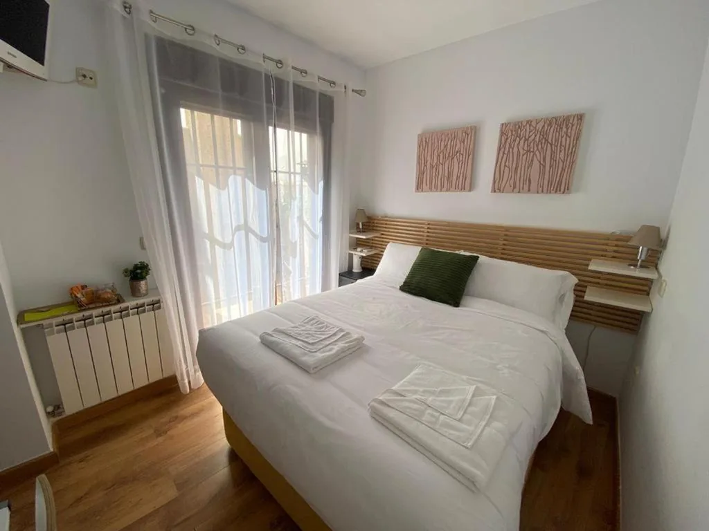 Camera doppia — El Mondalindo Habitación intima con patio