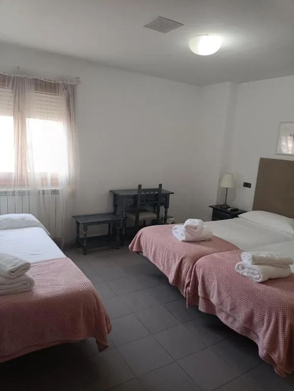 Quarto Duplo com Cama Extra — El Sueño del Infante