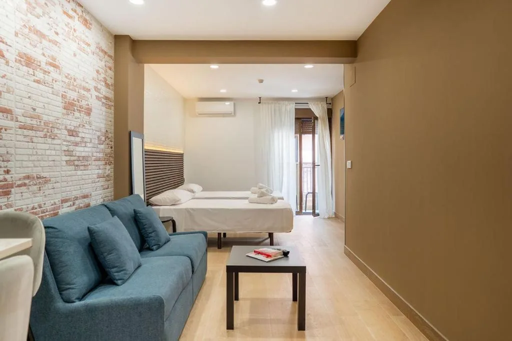 Estúdio com varanda — Emily Suites