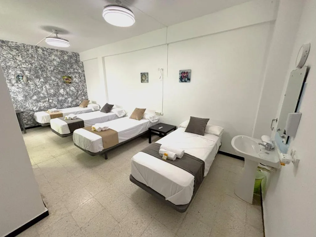 Standard-Vierbettzimmer — Evans Realty - Hostal