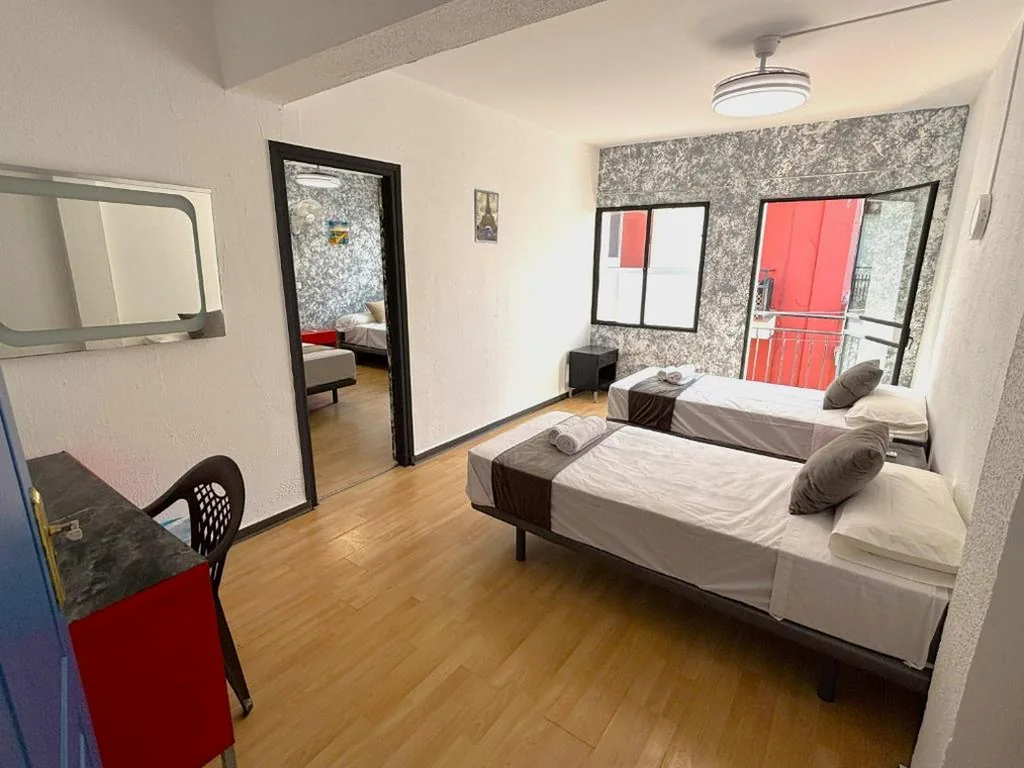 Superior-Vierbettzimmer — Evans Realty - Hostal