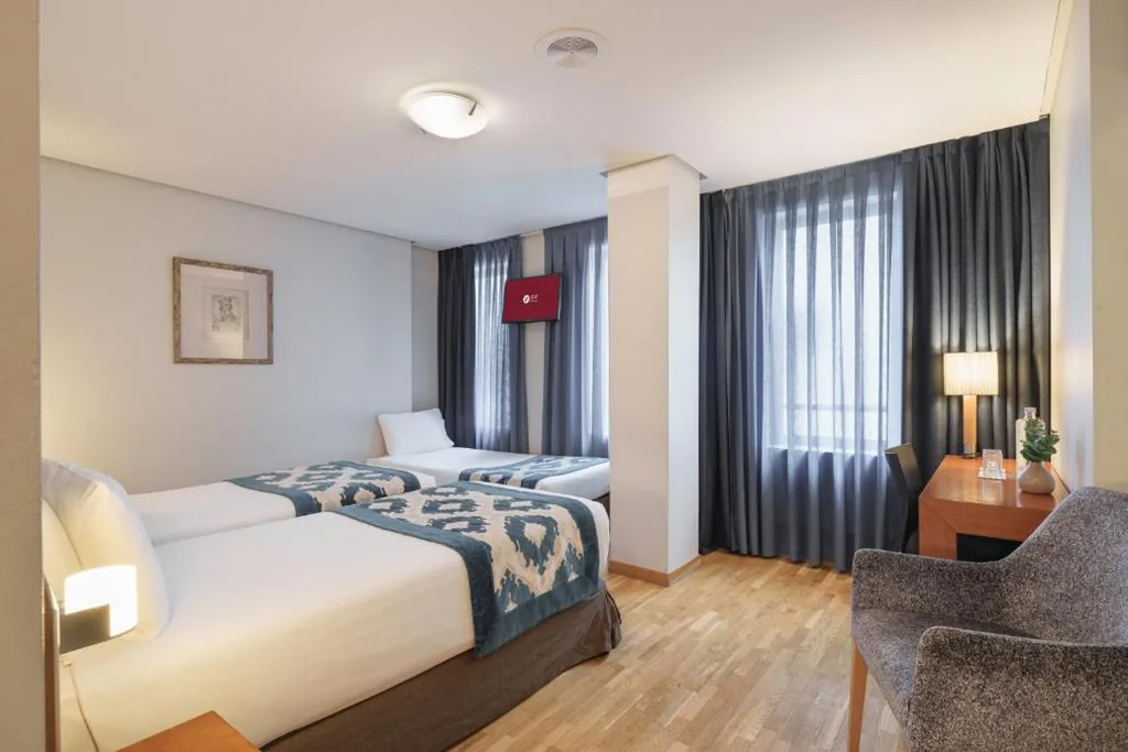 Camera doppia con letto supplementare — Exe Hotel El Magistral