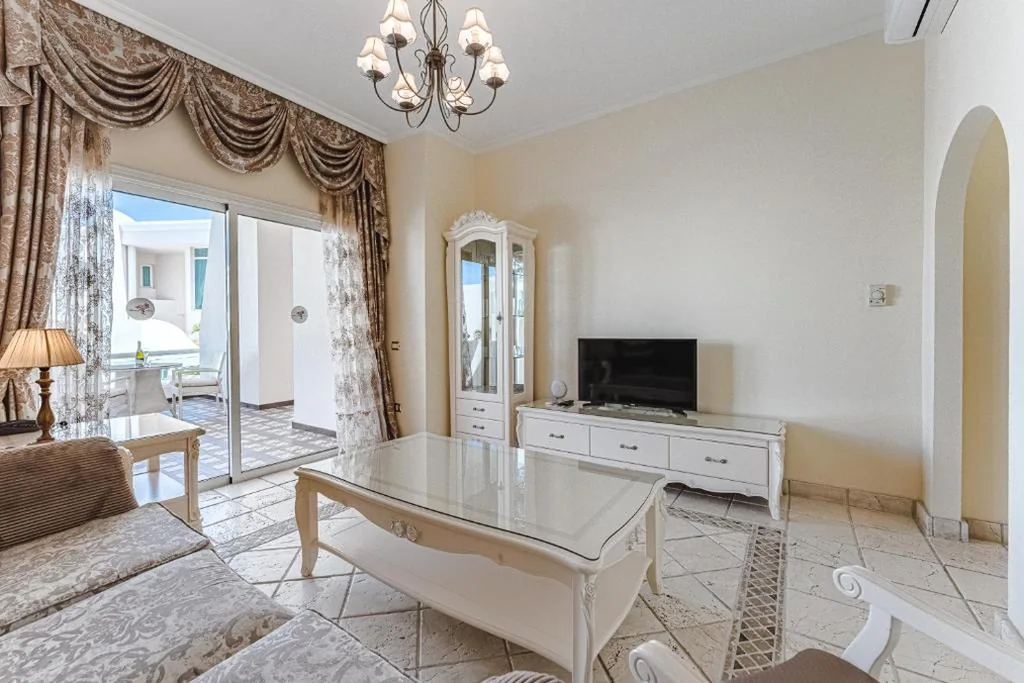 Suite (2 adultos + 1 criança) — Flamingo Suites Boutique Hotel