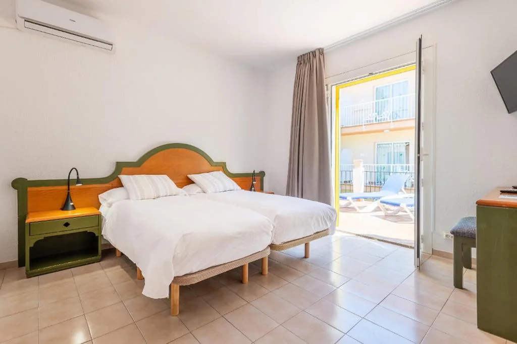 经济型双床间 — FLOR Amistad Hostal