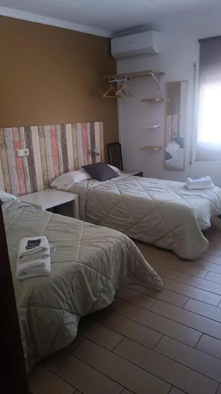 Tweepersoonskamer met externe eigen badkamer — Fonda Aparicio