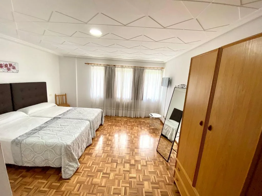 Quarto Duplo Standard com vista para o jardim - 2 camas — Garden Lodge Hostal Evencio
