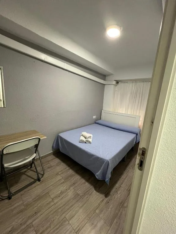 Habitación Doble con baño privado — Guesthouse Central