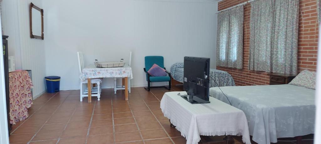 Habitación,Piscina y Jardín