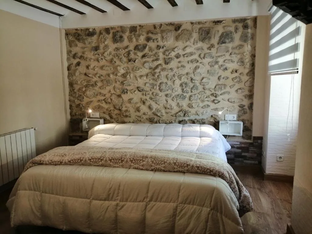 Habitación Deluxe con cama extragrande — Habitacion tienda de felipe EL DESPACHO