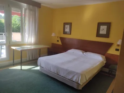 Habitación triple con bañera y terraza HOTEL SUITE MIOÑO — photo 2
