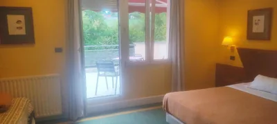 Habitación triple con bañera y terraza HOTEL SUITE MIOÑO — photo 7