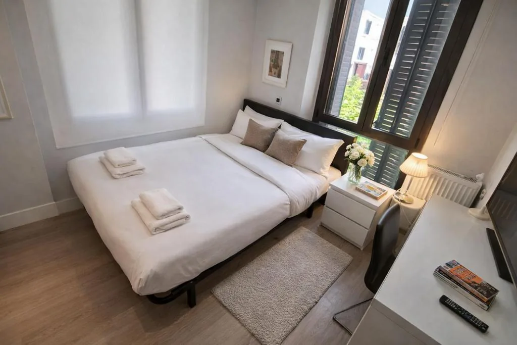 Quarto Duplo com casa de banho privativa — Habitaciones con estilo y comodidad en el centro de Madrid