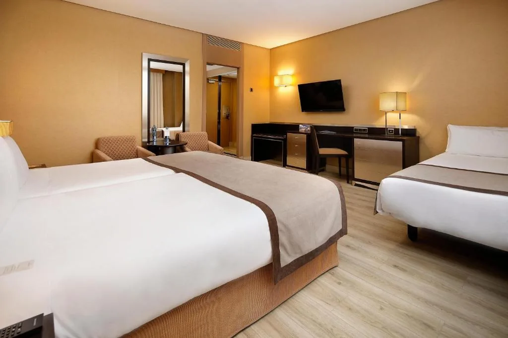 Quarto Duplo com cama extra (3 adultos) - 2 camas — HCC St. Moritz