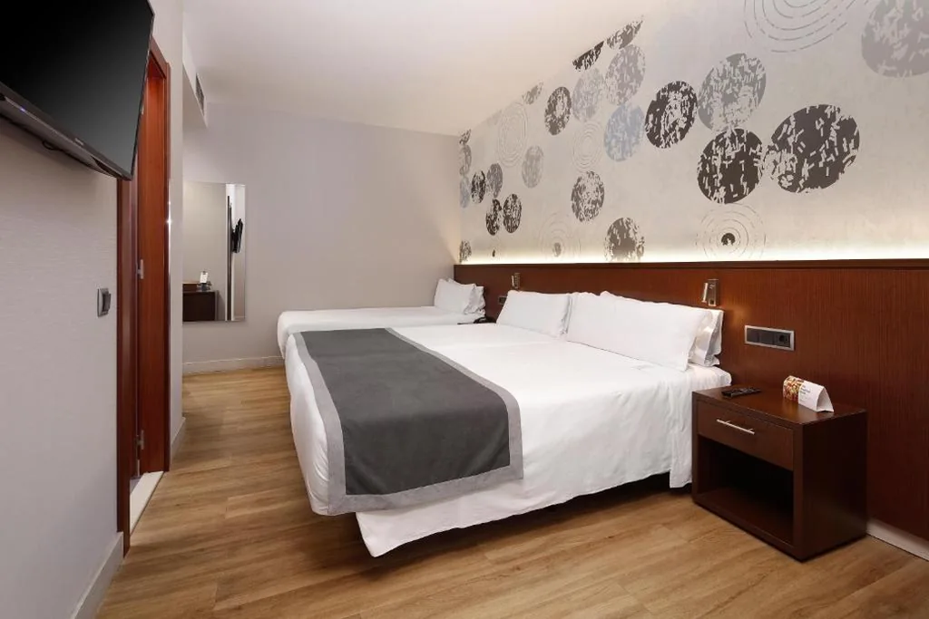 Habitación Doble con cama supletoria (3 adultos) - 2 camas — HCC Taber