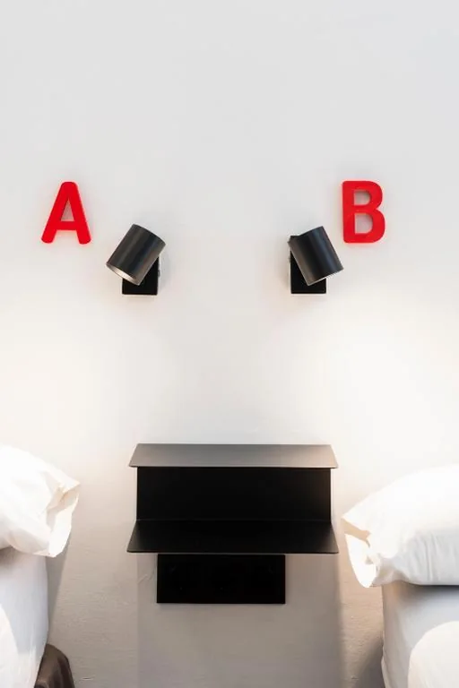 男女共用4人用ドミトリーのシングルベッド — Home Youth Hostel by Feetup Hostels
