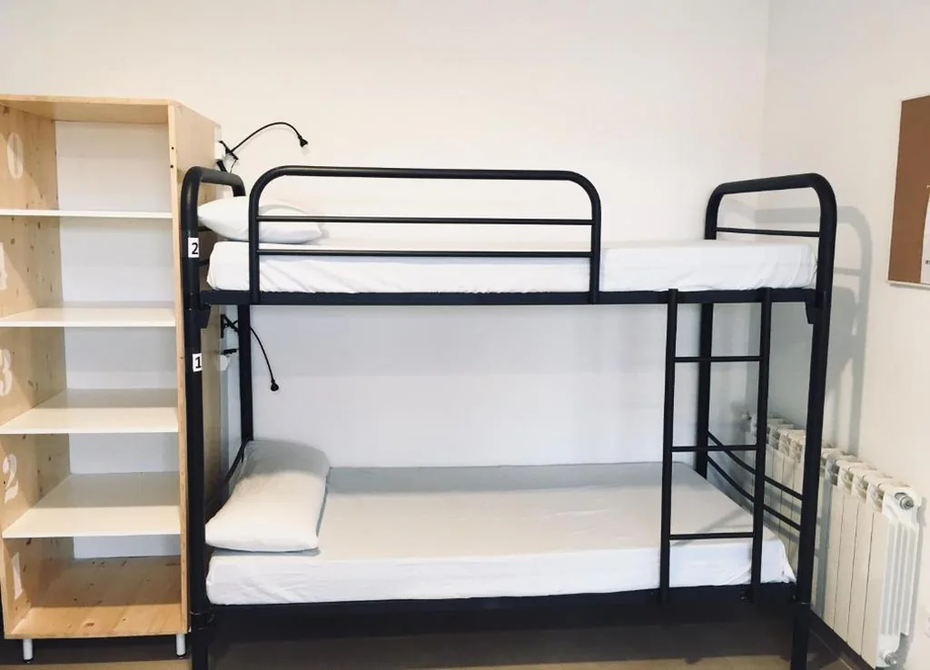 Cama en habitación compartida de 8 camas — Hornillos Meeting Point (Pilgrim Hostel)