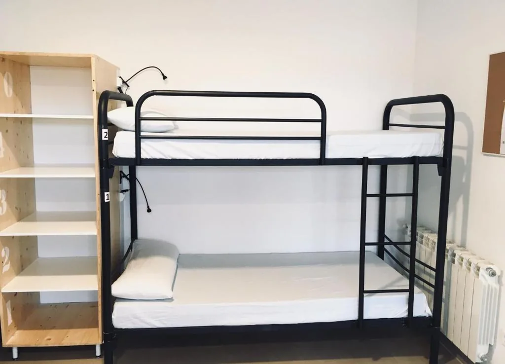 Habitación Cuádruple Clásica — Hornillos Meeting Point (Pilgrim Hostel)