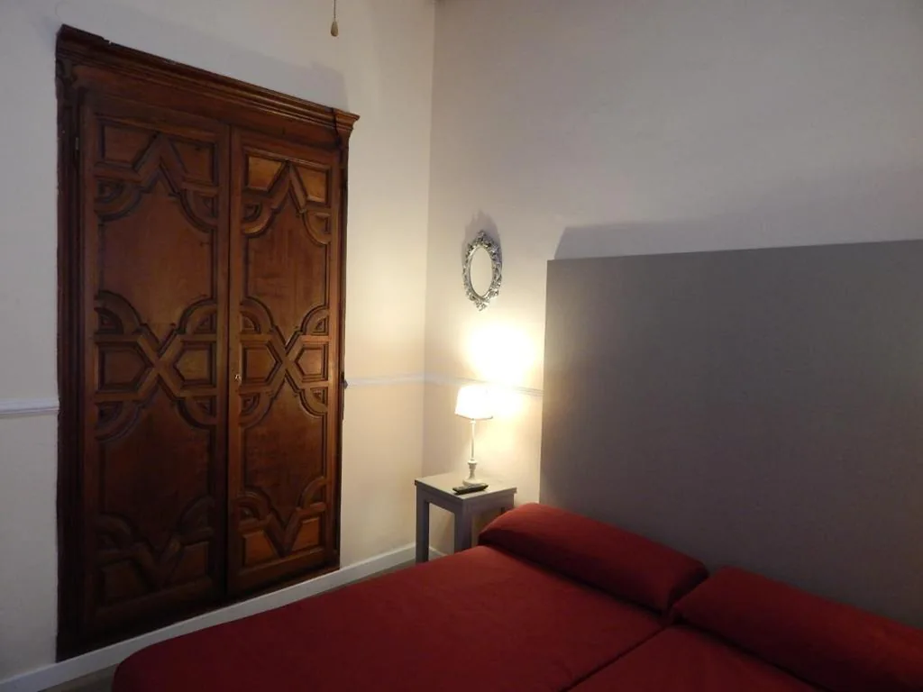 Camera tripla con bagno in comune — Hospederia Marqués